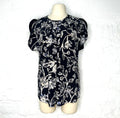 BALENCIAGA BALENCIAGA - Sleeveless Floral Black And White Blouse - ALE PARIS Luxury Vintage