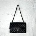 CHANEL - Black quilted caviar silver-tone jumbo black