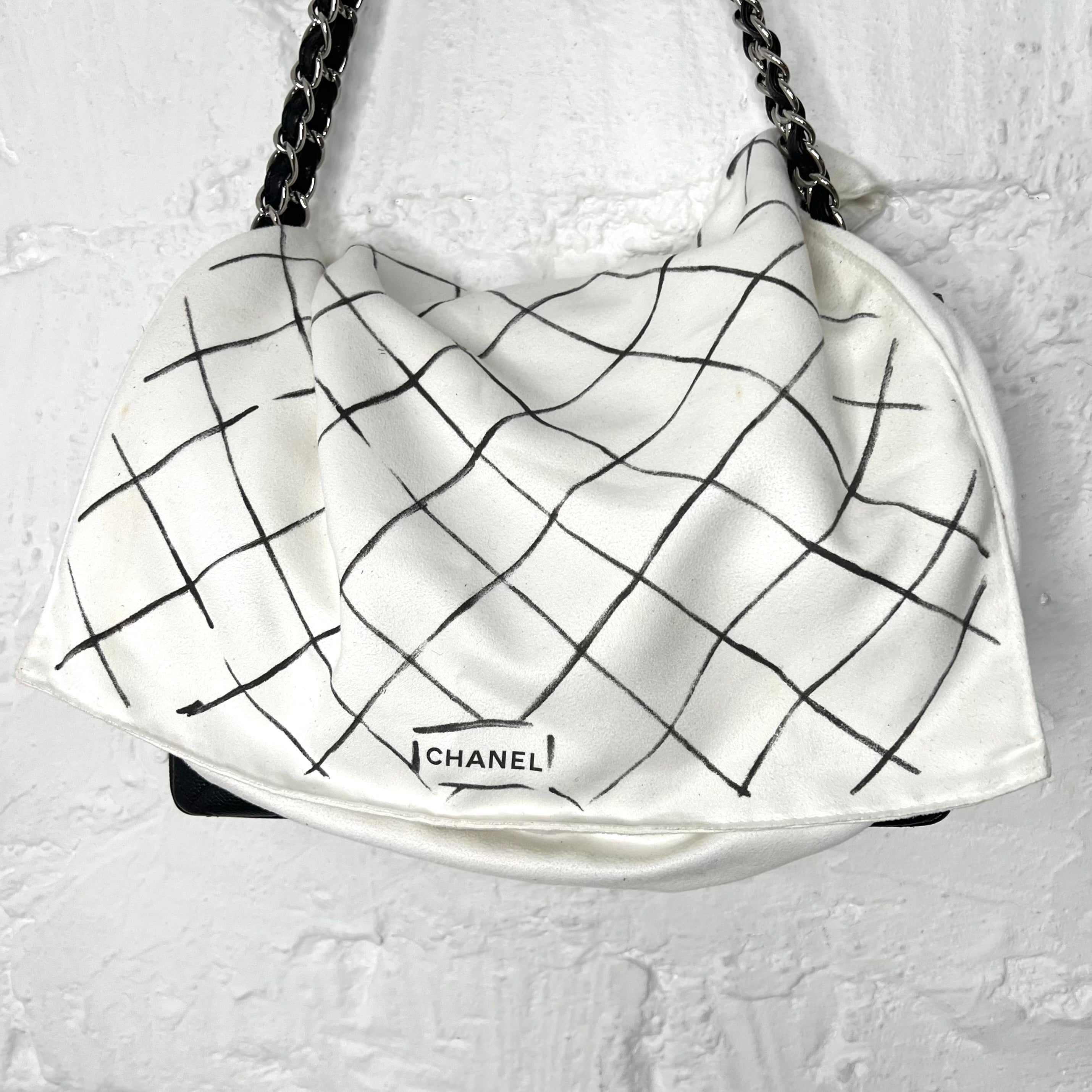 CHANEL - Black quilted caviar silver-tone jumbo black