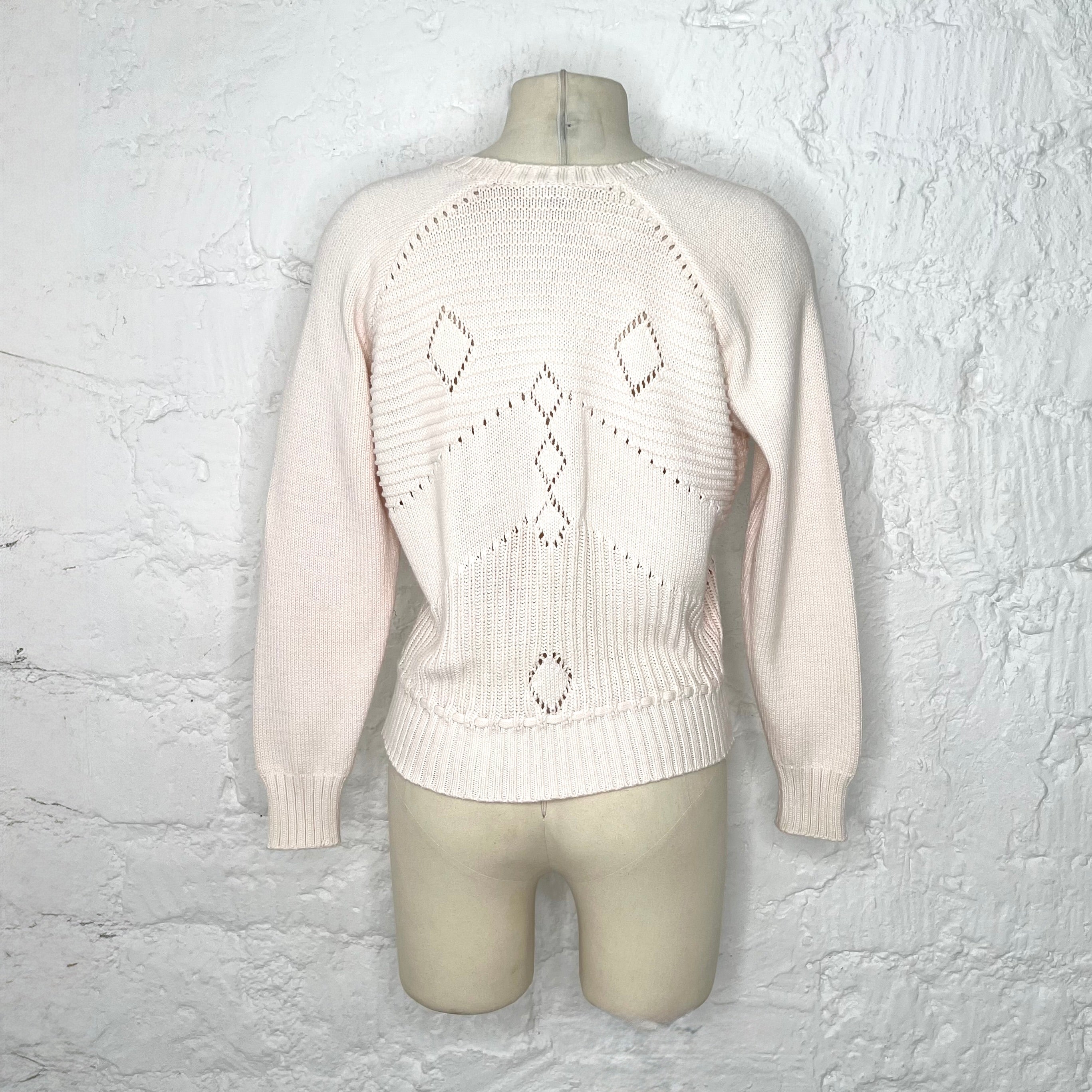 COURRÈGES - Off-white knitted sweater with embroidery